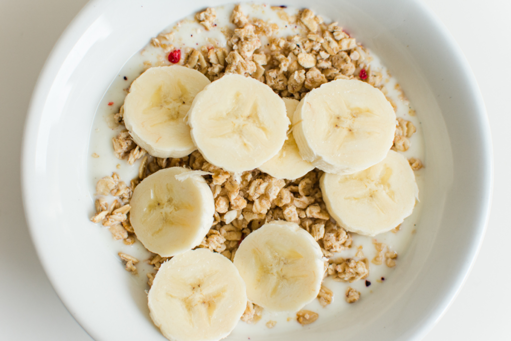 cereal topped with sliced banana