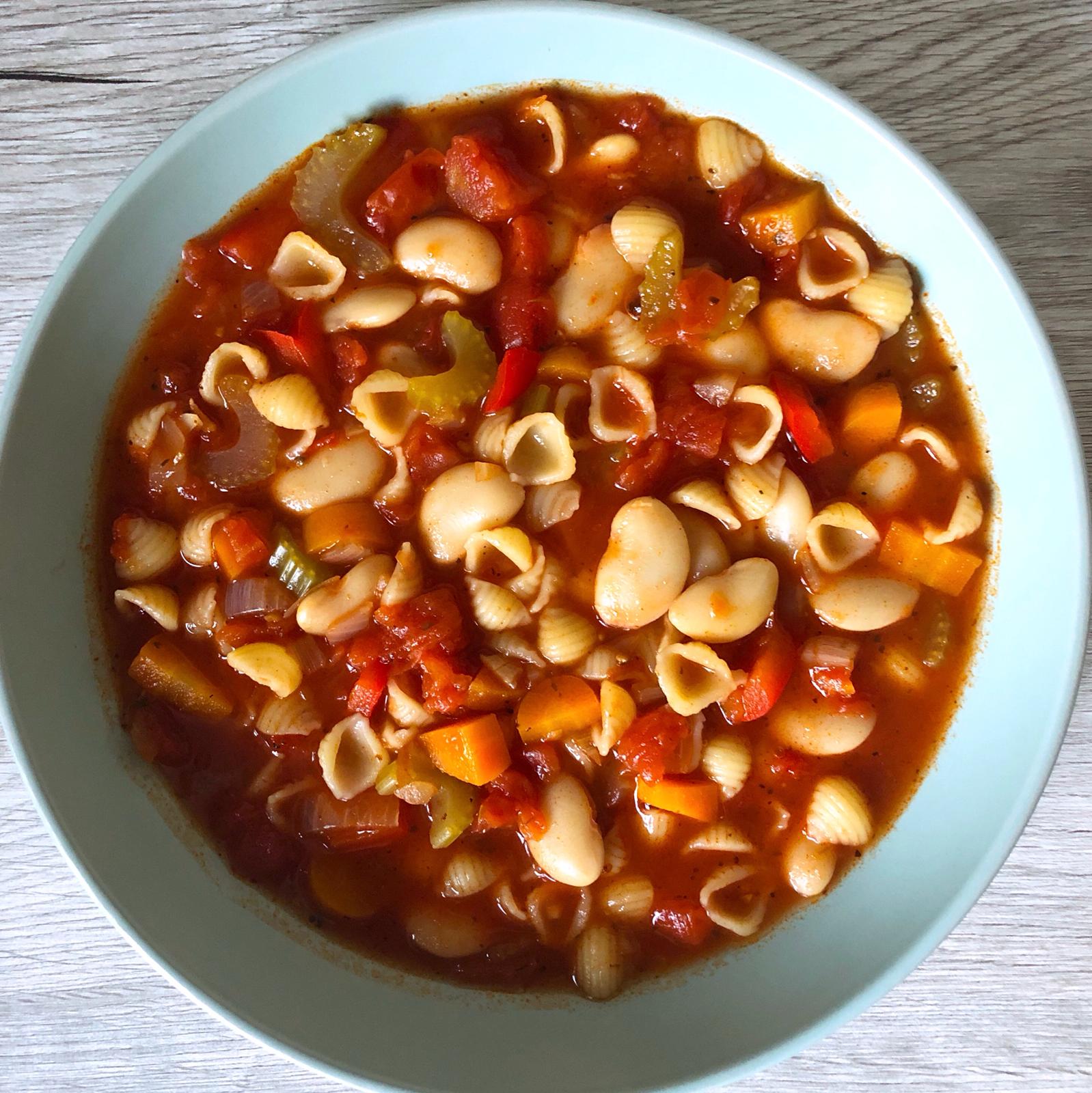 Bowl of spicy butter bean and tomato soup