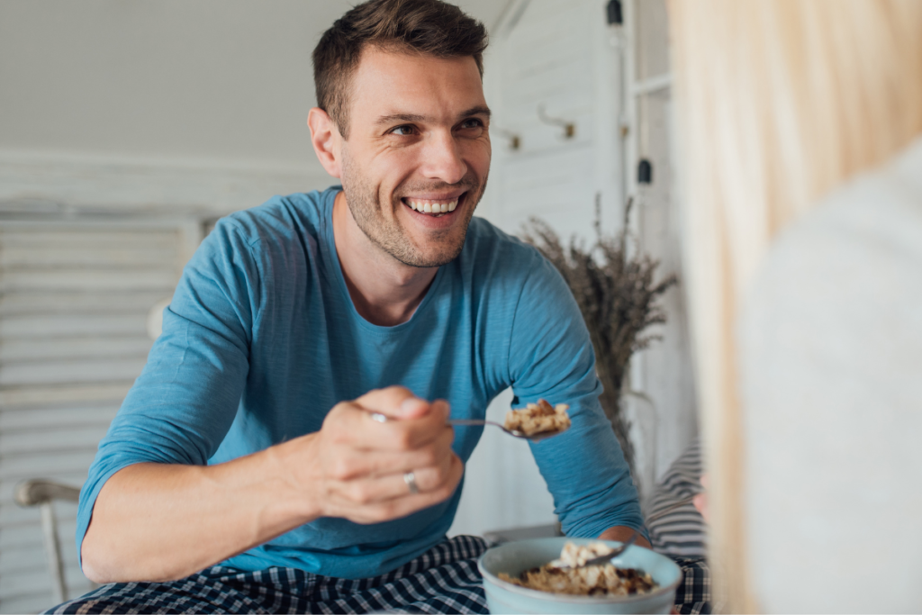 a man eating a bowl of cereal