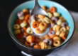 fruit loops and milk in a bowl